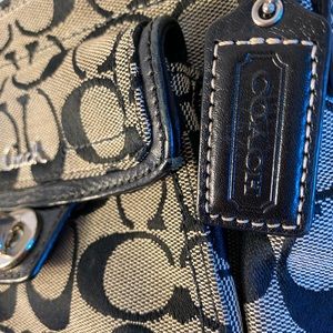 Grey and black logo coach crossbody bag